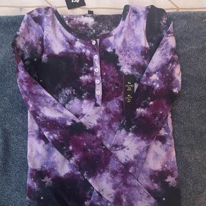 Girls purple and black long sleeve. New with tags. Size 14